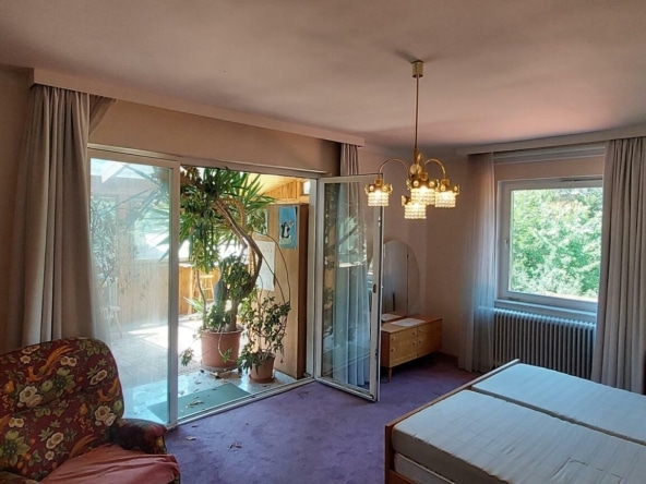 Schlafzimmer mit Wintergarten